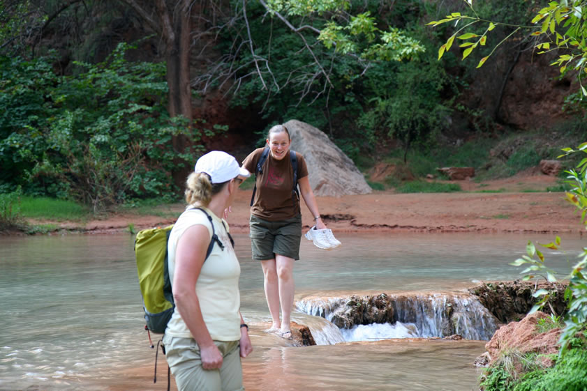 Niki leads them to the first water crossing and they quickly adapt to walking the pour-offs.