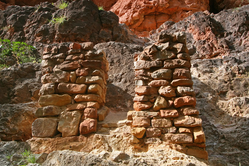 It looks like a support for the ore chute from the tunnels above.