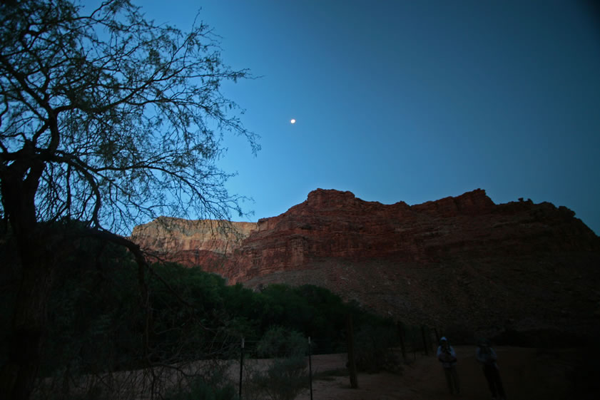 Yep, we packed up at 4:00 AM and made our way up the trail with help from the full moon and our little Photon button lights.  Now, as we approach the outskirts of the village, the first hints of sunrise brighten the sky.