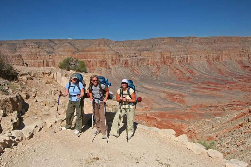 Joyce, Niki and Jenny pose for their proof picture at the next to last switchback.