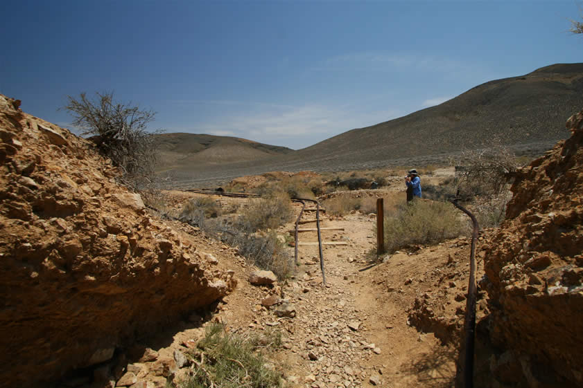 Looking back along the rails from the mine entrance.