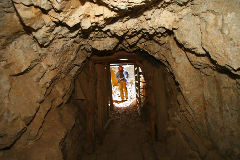 Niki about to enter the mine.  The last time we were here was in the winter and the bat gate was closed to protect the hibernating Townsend's big-eared bat colony, which is the largest population of these endangered bats in the California desert.  The Eureka mine was the first mine in Death Valley to receive a bat gate and it's proven to be a big success.