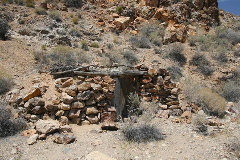 Near the Eureka mine tunnel is this stone walled dugout in which either Shorty Harris or Pete Aguereberry lived in the early days of the Harrisburg gold rush.