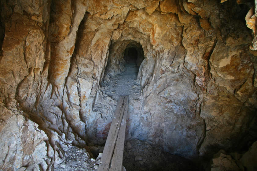 At the entrance we have to walk the plank to get over a pit in order to explore the remainder of the tunnel.