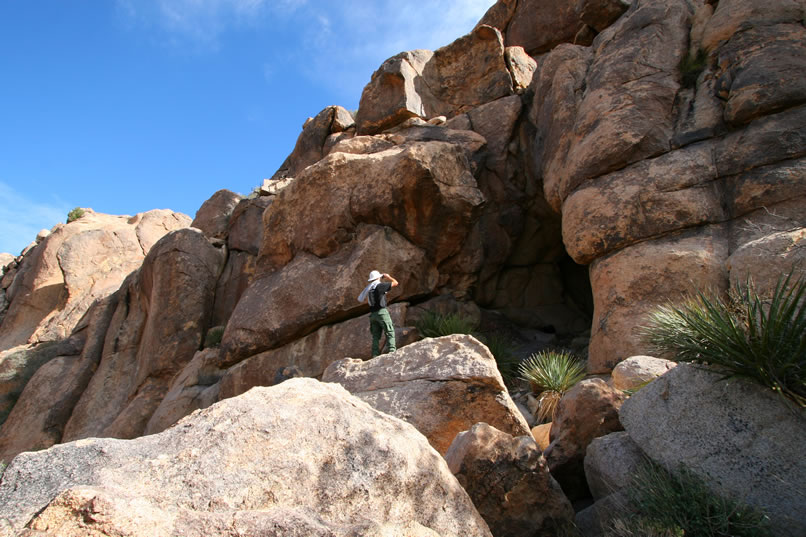 After a last couple of looks at the cave, we decide to direct our attention to a little flat area just below the cave entrance.