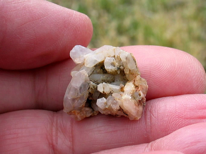 While taking a snack break, we find a small quartz crystal cluster.