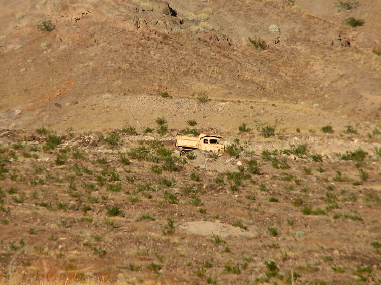 A telephoto view of a retired ore hauler.