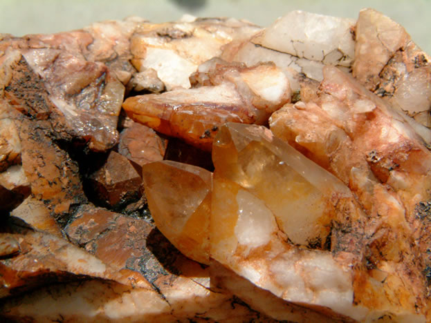 iron stained quartz crystal cluster