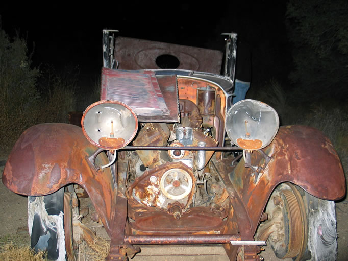 As much fun as stumbling around the mill in the dark was, we decide to come back in the morning for a clearer view.  As we exit the back of the mill, we encounter this ghostly 1929 Lincoln Phaeton.