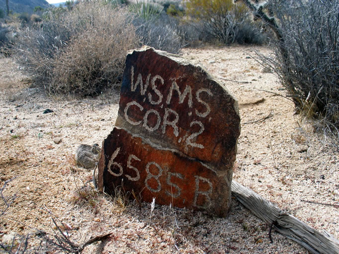 As we leave the mill, Dezdan calls out that he's found the S.W. corner marker carved by Keys.