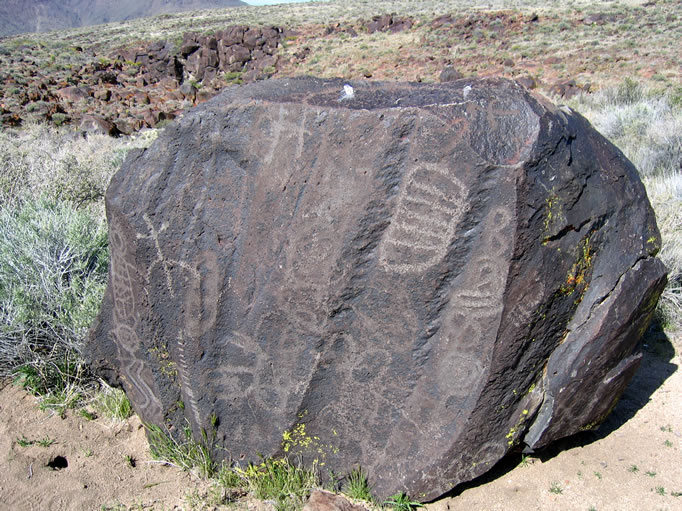 This boulder marks the beginning of the Little Petroglyph Canyon trail.