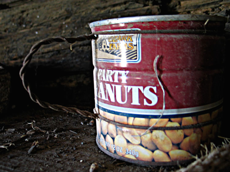 Wire + peanut can = mug.