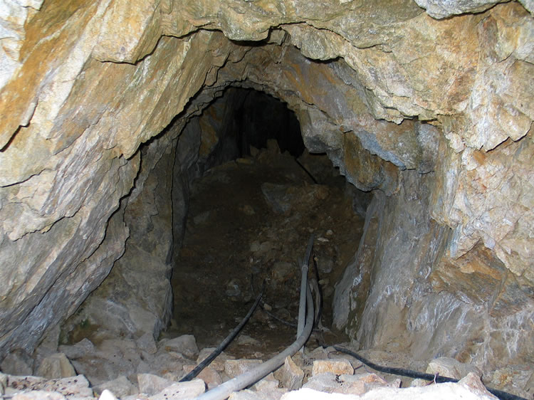 A look inside at the earth dam that collected the water seeping from inside the tunnel.