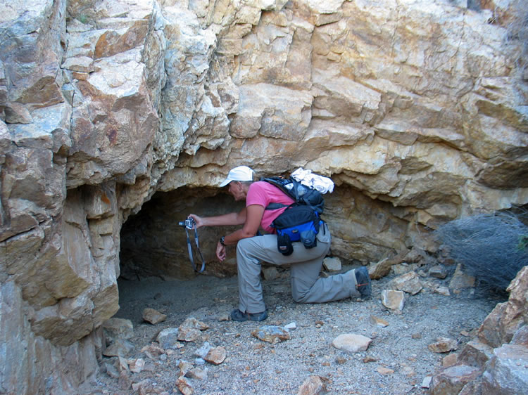 Either the miners were very short or a lot of earth has filled in the bottom of  the tunnel.