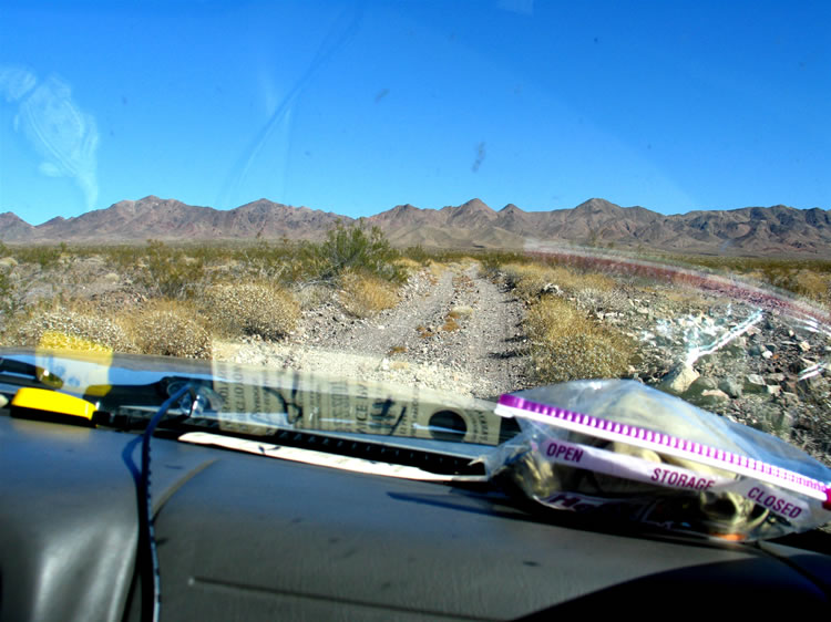 The Lizardmobile and Howard's Explorer make pretty good time on this typical desert road.  However, we're due to turn off shortly onto a less hospitable two track.