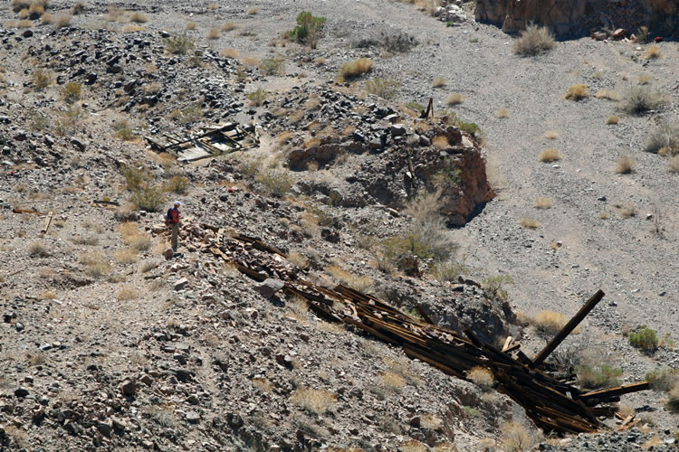 From the same spot she can also look down upon the collapsed ore bin and mine building.