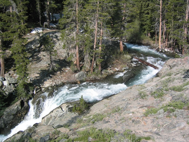 Melting snows swelled the river.