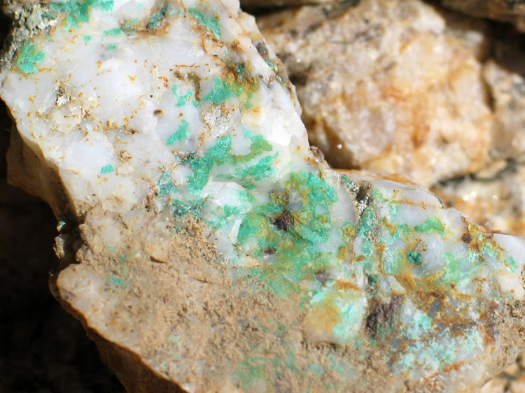 Quartz with what appears to be some copper mineral stains.