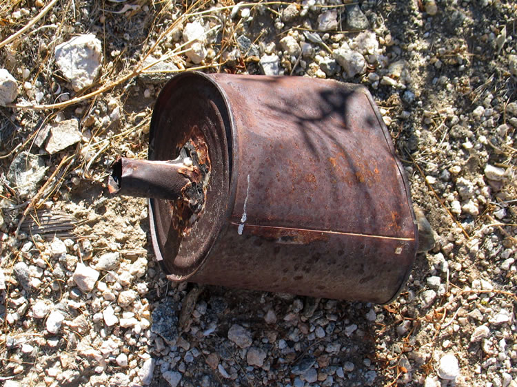 It appears that a lot of vehicle maintenance took place here.  This home made funnel is joined by countless oil cans, filters, gaskets and so on.