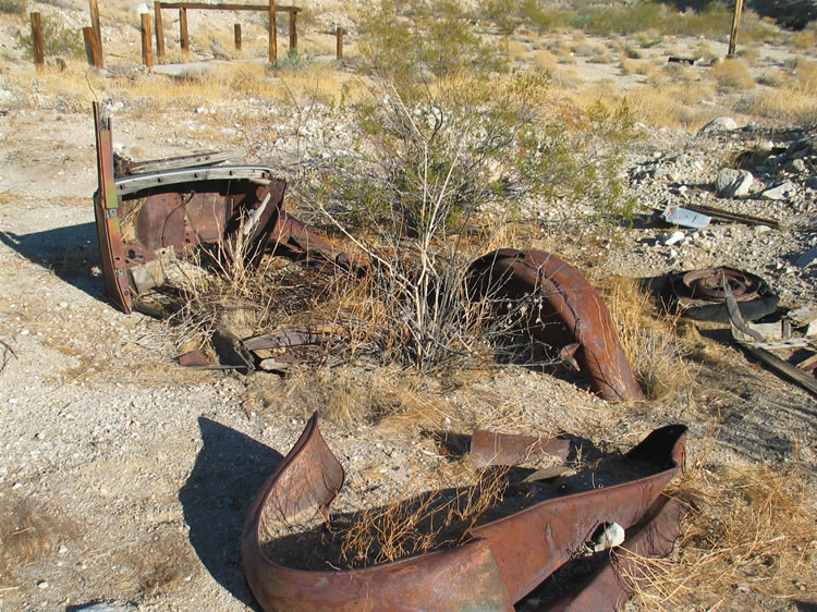 Nearby are also the scattered remains of a much older vehicle.