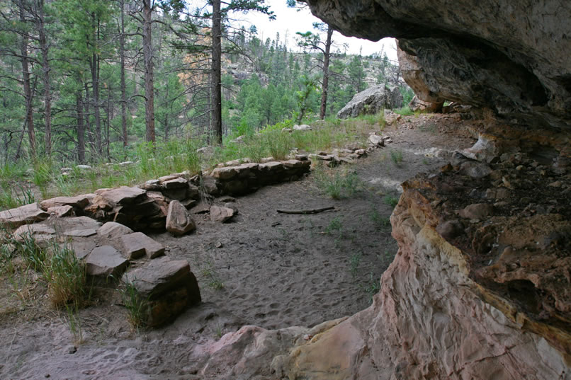 Later phases involved rock wall foundations and a more permanent structure such as that seen in the rendering on the interpretive panel.