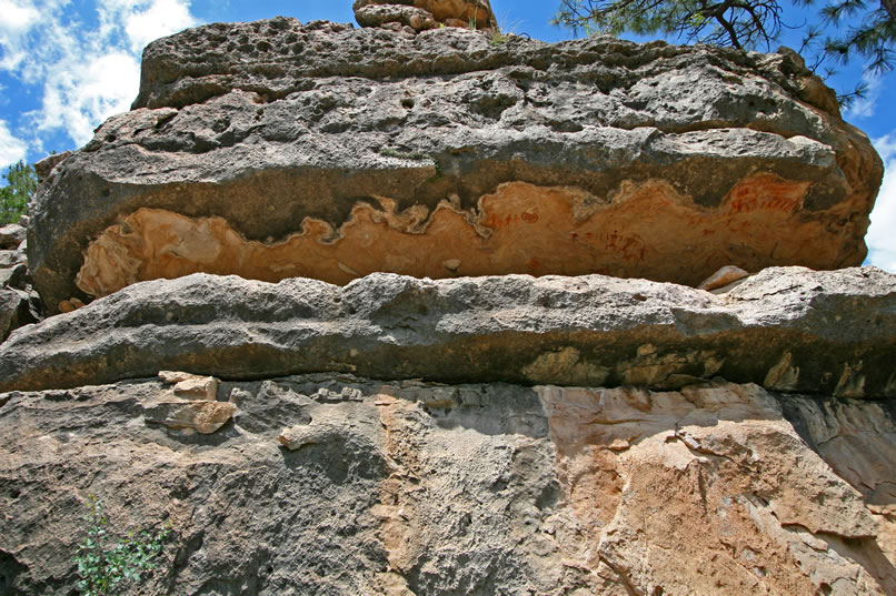 Here's a wide angle view up at the ledge that Niki's on and the pictographs on the underside of the overhang.