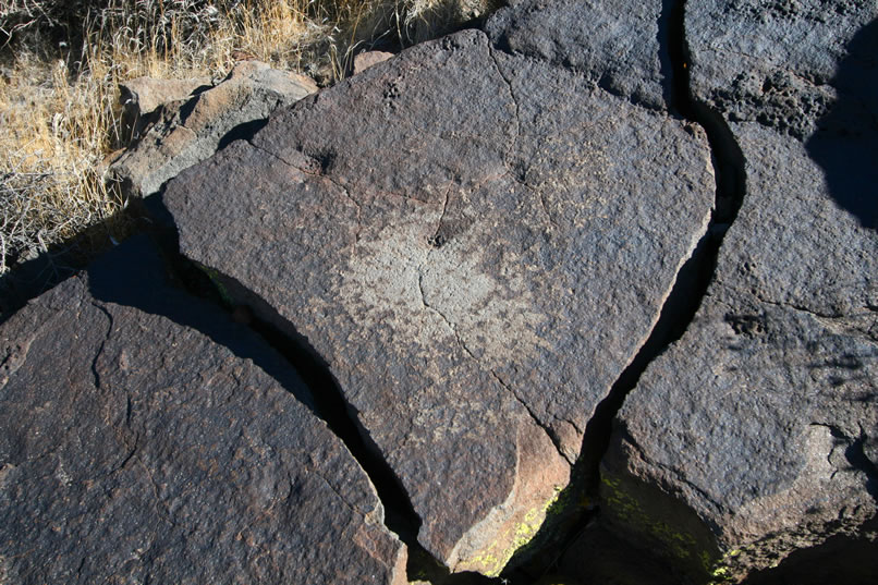 A nearby grinding slick hints that at one time some food preparation took place here.