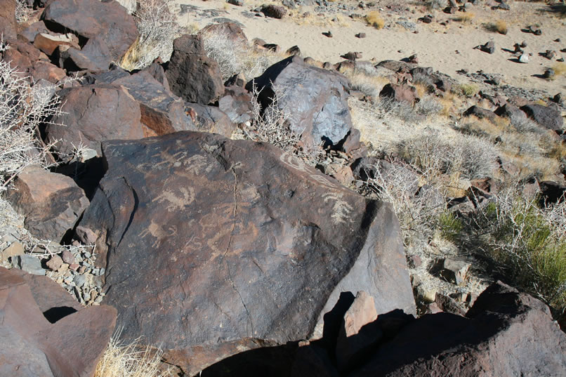 The top of this boulder has a lot going on.