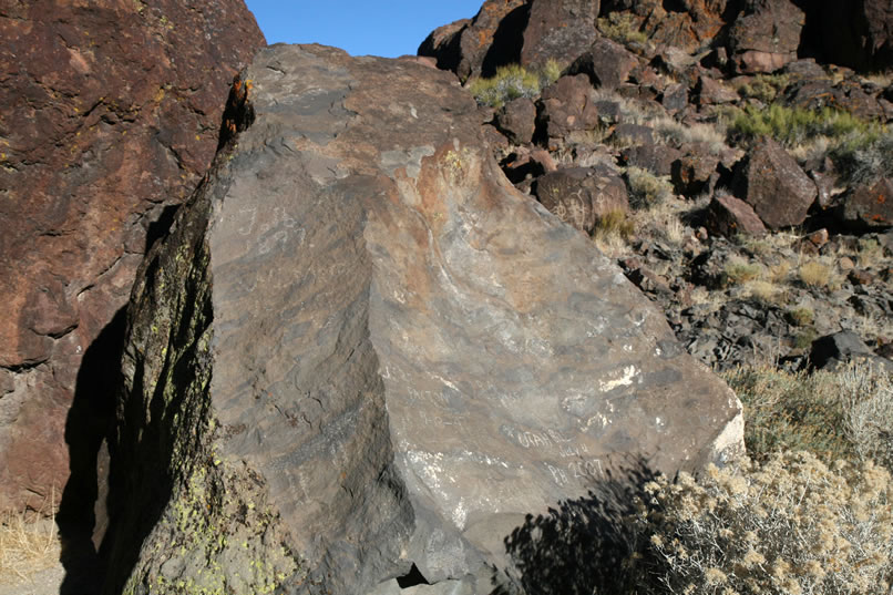 As if we hadn't missed enough stuff already, our next find leaves us scratching our heads!  It appears that on the way up we passed just on the other side of several really neat historic inscriptions.