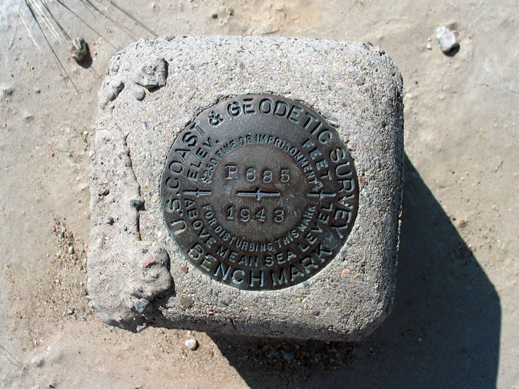 Numerous benchmarks parallel this historic road.  In the early 1900's Charles Bennett's borax laden 20 mule teams plied this route from Saratoga Springs up the long alluvial fan to Owl Hole Spring and then through what is now Fort Irwin  to Granite Springs and on to Mojave and the railroad.