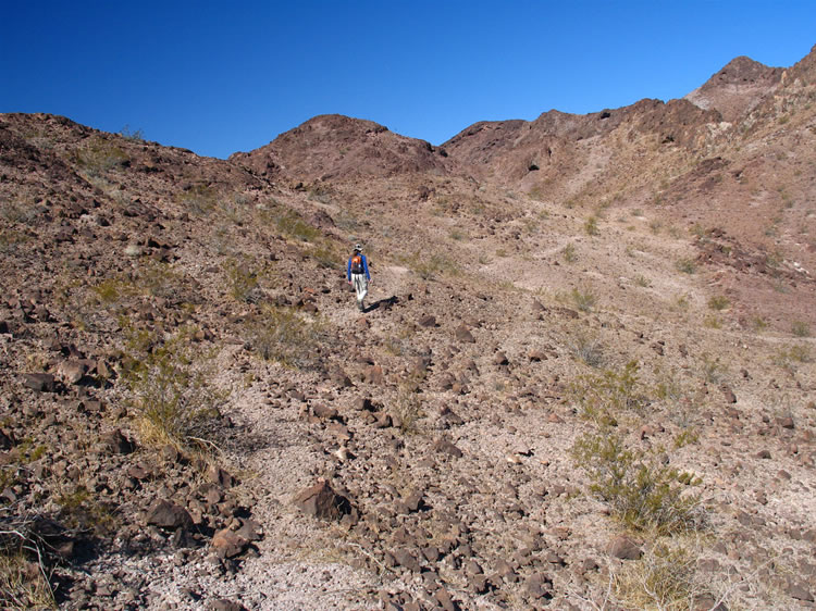 Here's Niki doubling back along the canyon trail to retrace our route to the rock shelter and continue on to the south for more rockhounding.