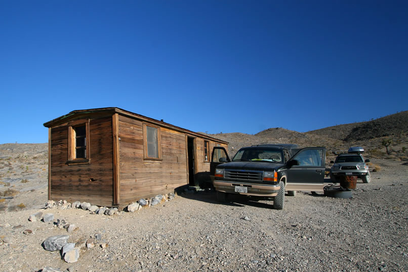 Our rendezvous point this morning is at the Buckhorn Cabin.  Boxcar Dan is loading up his truck as we arrive.  Dan began the restoration of this cabin in 2003 and a long labor of love followed.  It's now one of the BLM Adopt-A-Cabin sites where explorers may spend the night and in return help maintain the site.