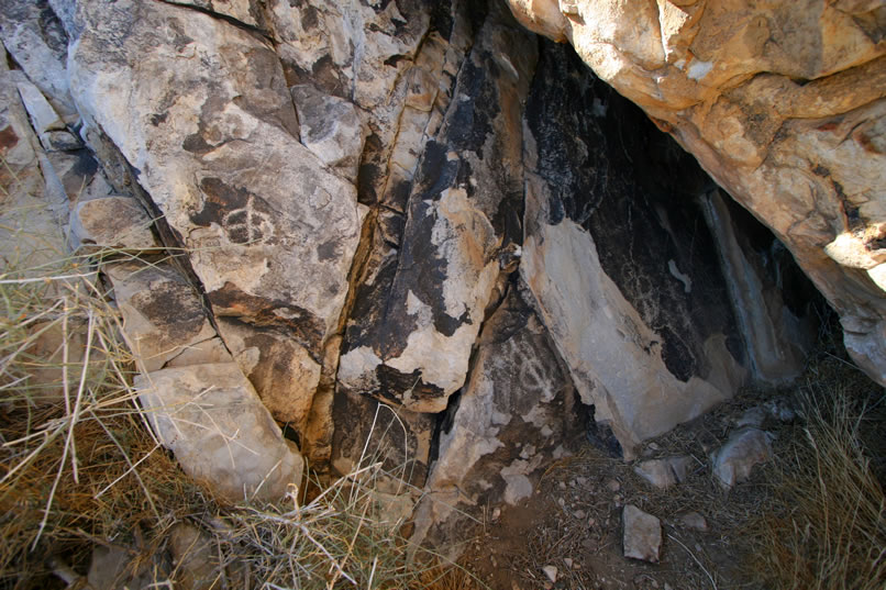 Some researchers feel that the bisected circle is a female fertility symbol while the circle with the cross inside is a male fertility symbol.  How fitting that both should be found at the entrance to this natural opening in the rock.  We can't wait to see what we find on the other side of the outcrop where the other end of the fissure is!