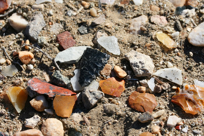 Finally, though, we find not only chips from tool making but also an obsidian point.  Remember, admire what you discover, take photos, but do not remove artifacts!