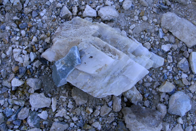 As this calcite crystal shows, it was primarily a talc mine.  However, the ore also contains some tungsten and gold mineralization.  It was the gold content that started the first rush of prospectors to Goldbelt Spring.