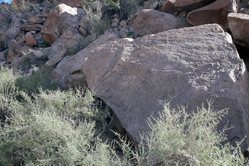 There's also a historic inscription nearby with a 1938 date.  While these aren't huge finds, we're pleased because our hunch about there being rock art here has pretty much been validated.