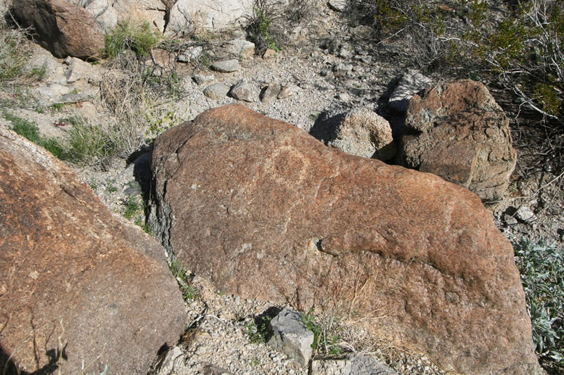 Nearby is another small petroglyph and near it is...
