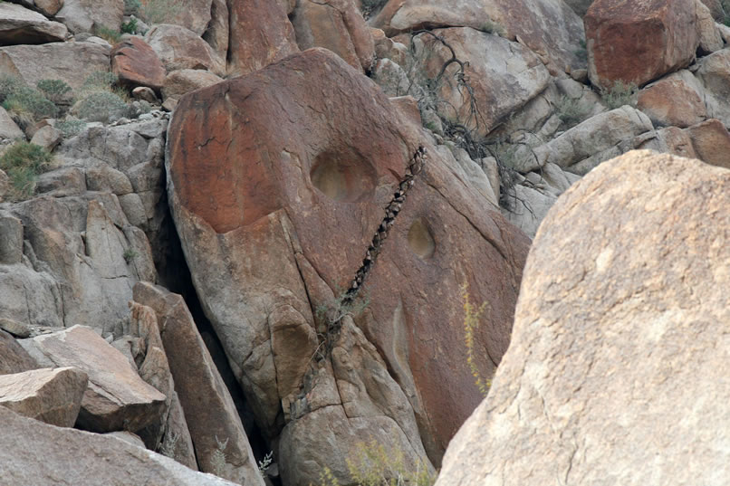 As she squeezes up the canyon she gets this photo of a really interesting rock formation.