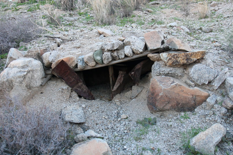 Heading over to the mine itself, we spot this odd little shelter.  Possibly it was used to store explosives or to keep food cool.