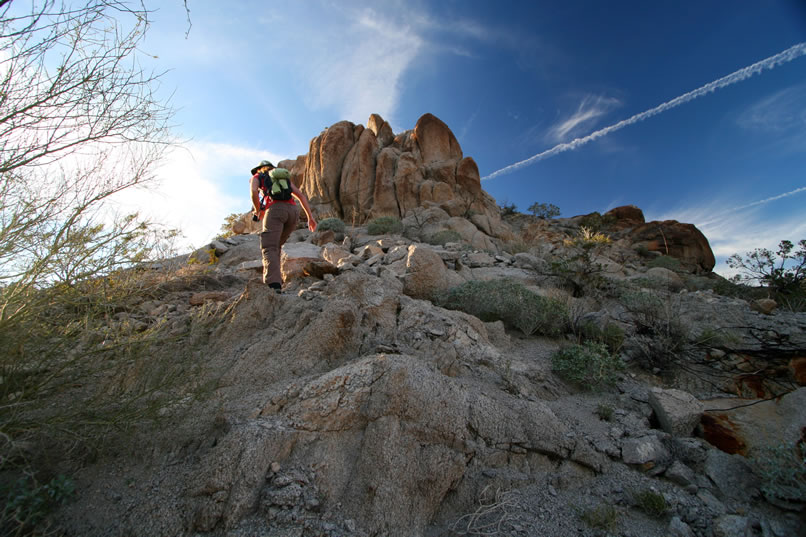 Niki does a quick scramble over the ridge to be sure that we haven't left anything unexplored on the other side.  Since she doesn't see anything, we make our way down to the boulder pile we saw earlier.