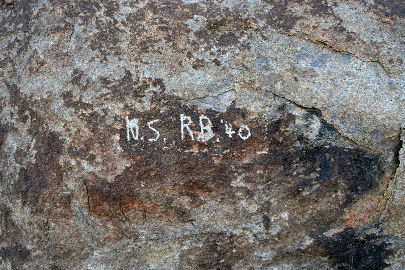 We also find a historic inscription with a 1940 date that matches the date of the mining claim.