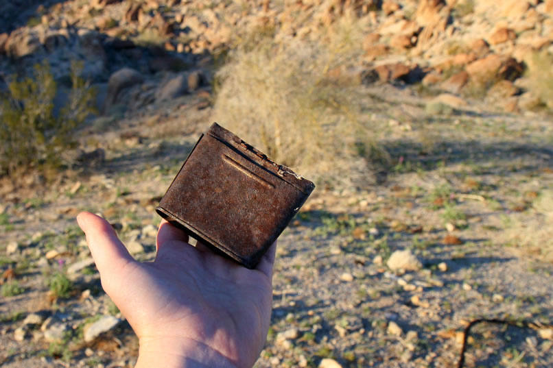 A collapsible tobacco tin.