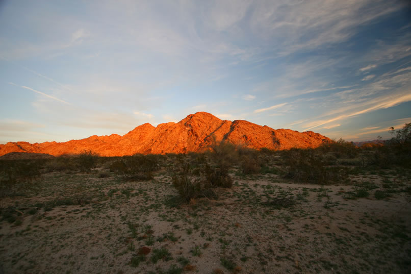 Looking back at the colorful hills over our shoulders.  The hiking is slow because our route takes us across the washes now instead of with them.