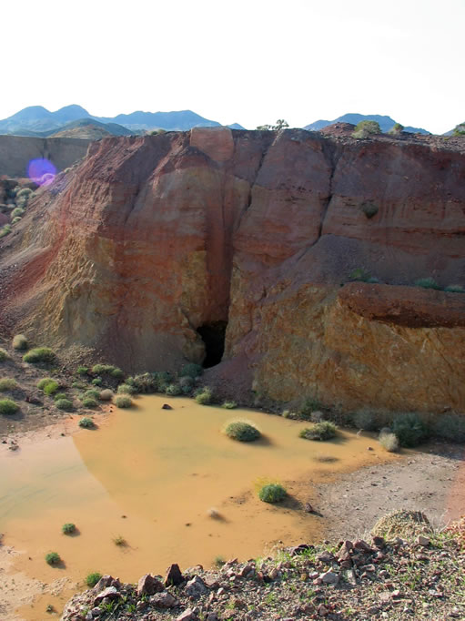 A look into the pit, which has captured some of the recent rainfall.