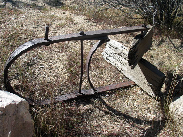 This iron contraption appears to be hand forged.  Help us out here!  Any ideas as to its use?
