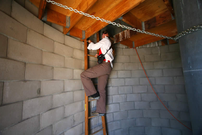 Once inside, a bit of ladder work takes Niki up into the dome.