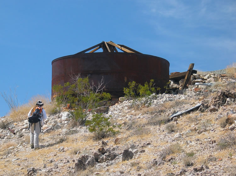 Niki climbs up to check out the water tank.  Water had to be trucked in from Cottonwood Springs, about 21 miles away.