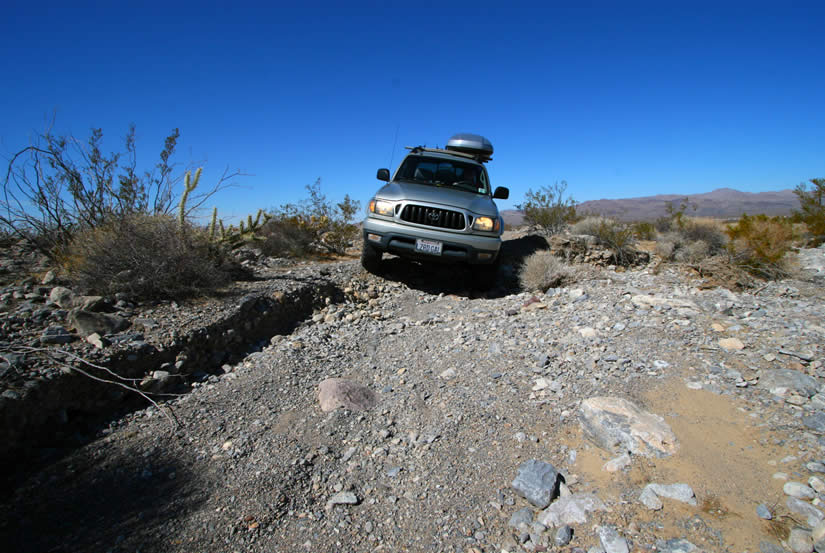 Our travel isn't nearly as elegant.  Thank you, Dezdan, for the workaround to avoid the really bad wash and for the stacked rocks to ease the entrance and exit from countless other washes.