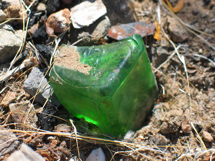 What's left of an interesting little green bottle.