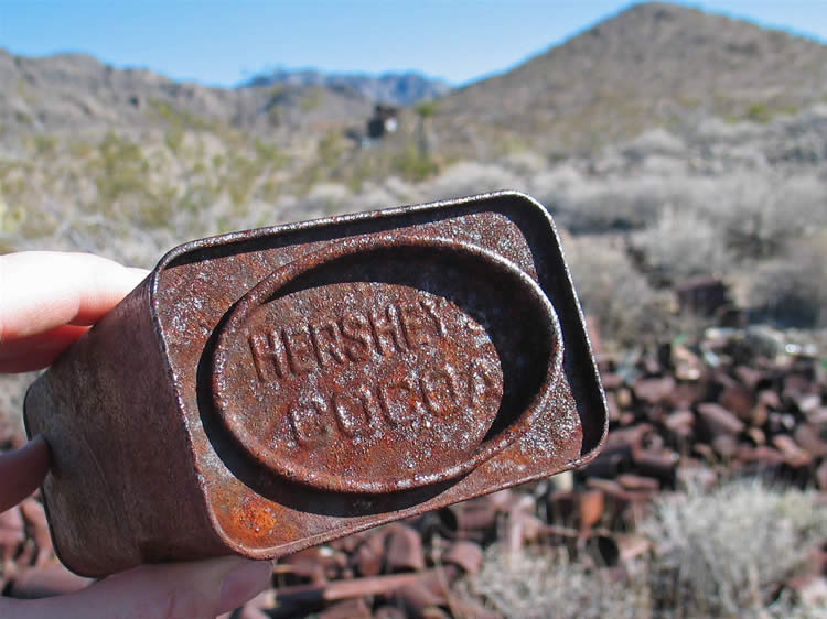 Mmmmm!  Cocoa!  Now we're talking!  The blur above the cocoa tin is the ore bin of the Rex Mine.